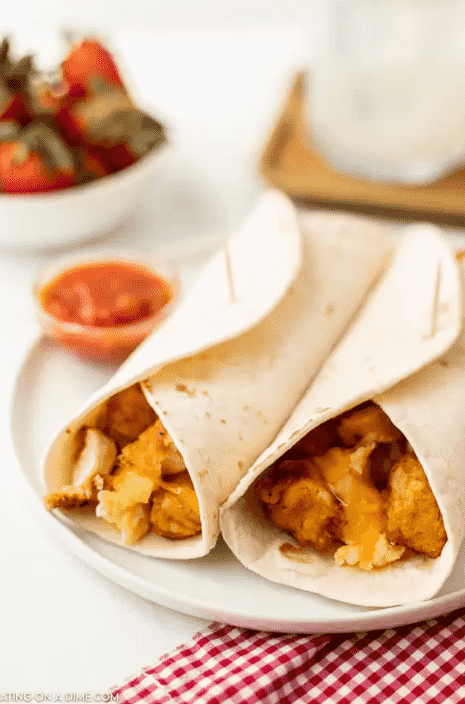 Breakfast burritos on plate.