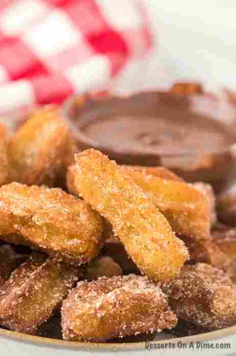 Churros with chocolate.