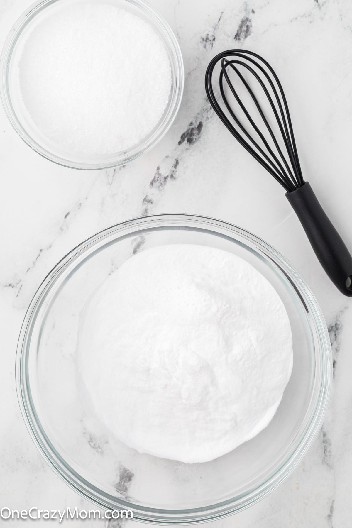 Mixing bowl with dry ingredients combined together.