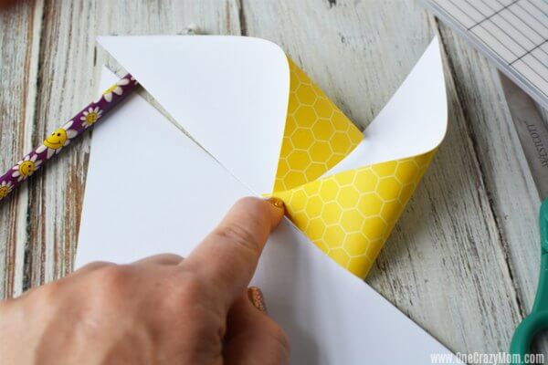 Each corner folded back to form pinwheel.