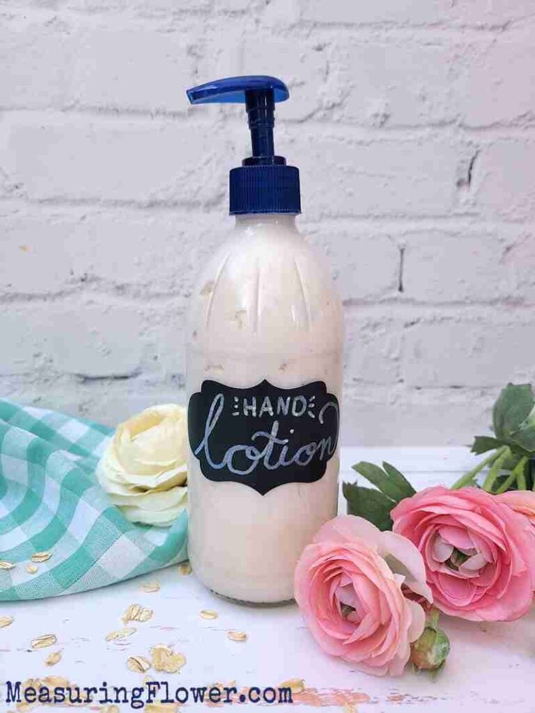 Lotion in a pump beside roses.