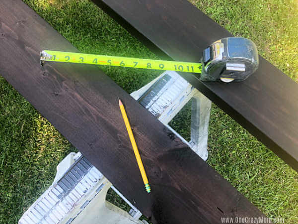 Tape measure on boards.
