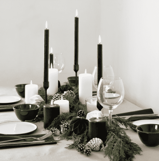 Scandinavian table setting with black candles.
