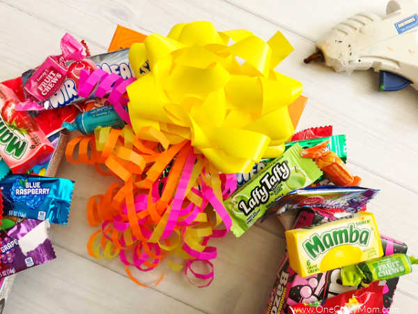 Learn how to make a candy wreath that everyone will love. This easy candy wreath is so fun and a great gift for any occasion. Try this fun and frugal idea. Learn how to make a candy wreath that everyone will love. This easy candy wreath is so fun and a great gift for any occasion. Try this fun and frugal idea.