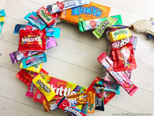 Learn how to make a candy wreath that everyone will love. This easy candy wreath is so fun and a great gift for any occasion. Try this fun and frugal idea. Learn how to make a candy wreath that everyone will love. This easy candy wreath is so fun and a great gift for any occasion. Try this fun and frugal idea.