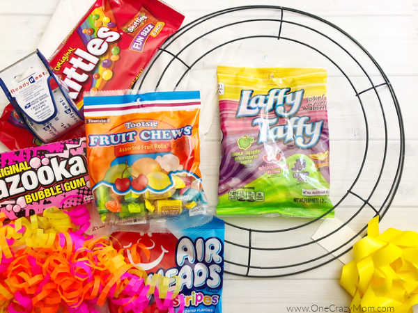 Learn how to make a candy wreath that everyone will love. This easy candy wreath is so fun and a great gift for any occasion. Try this fun and frugal idea. Learn how to make a candy wreath that everyone will love. This easy candy wreath is so fun and a great gift for any occasion. Try this fun and frugal idea.