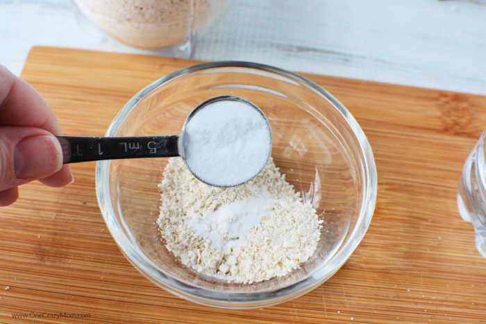 Baking powder added to bowl.