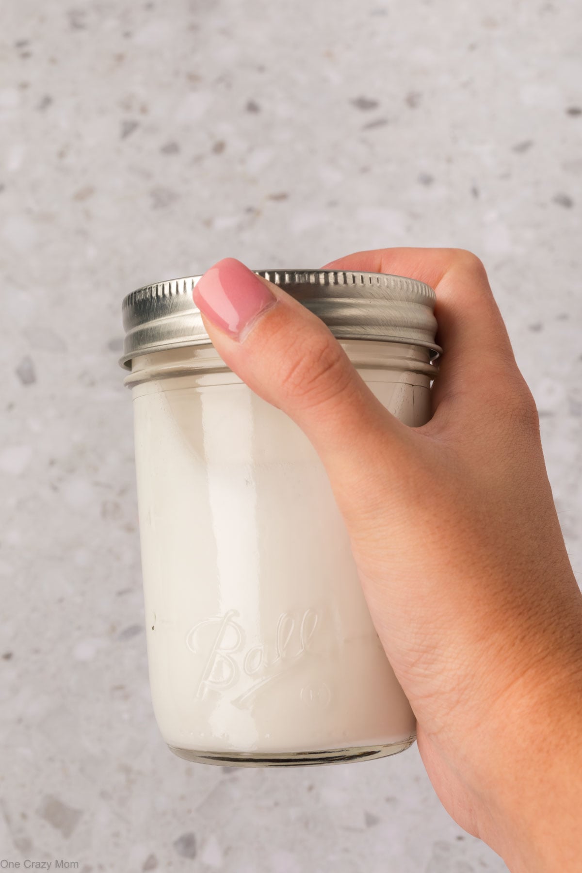 Mason jar with supplies shaken up.