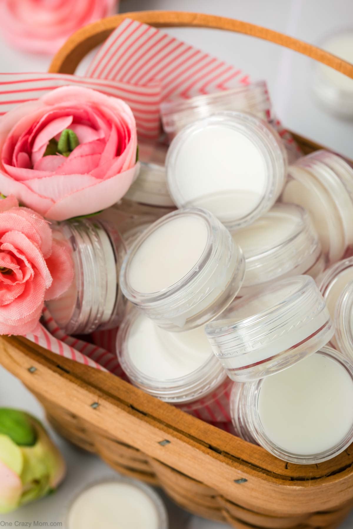 Homemade Lip Balm in containers in a basket.