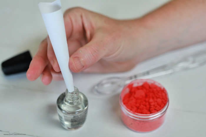 Funnel in nail polish.