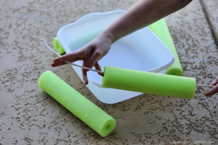 Rope threaded into pool noodle.