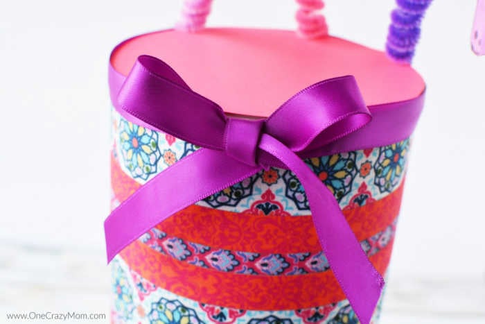 Bow attached to container.