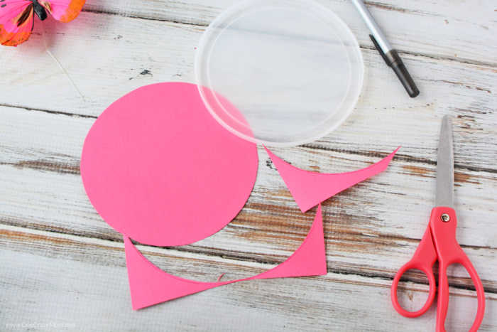 Paper ready to attach to lid.