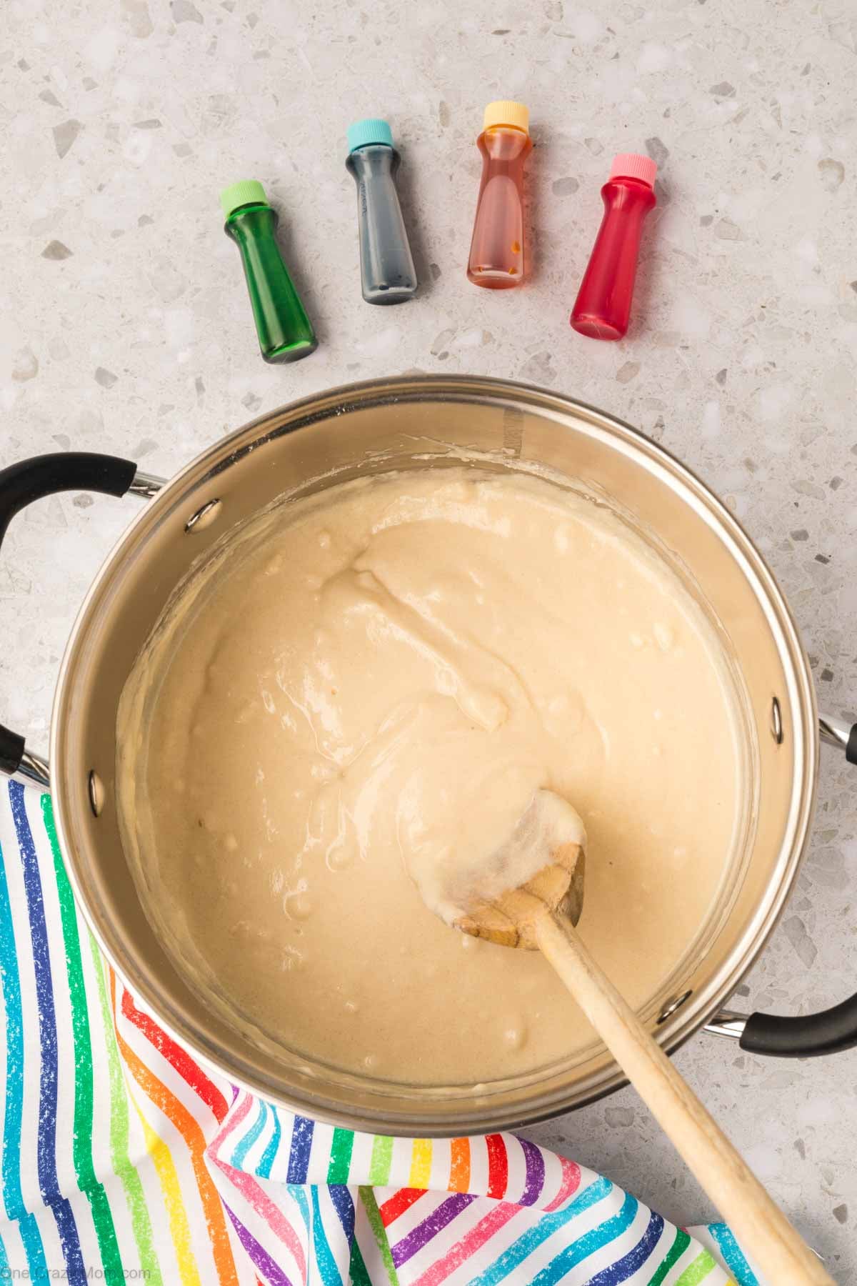 Playdough mixture combined in pan.