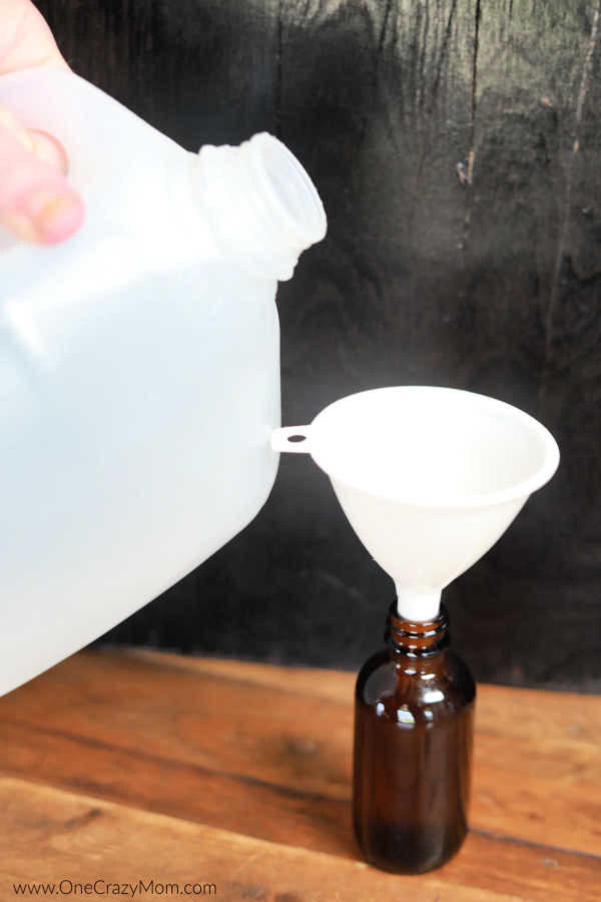 Water poured into bottle.