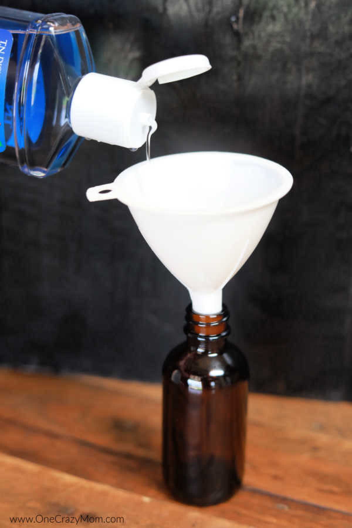 Witch Hazel added to the bottle with a funnel.
