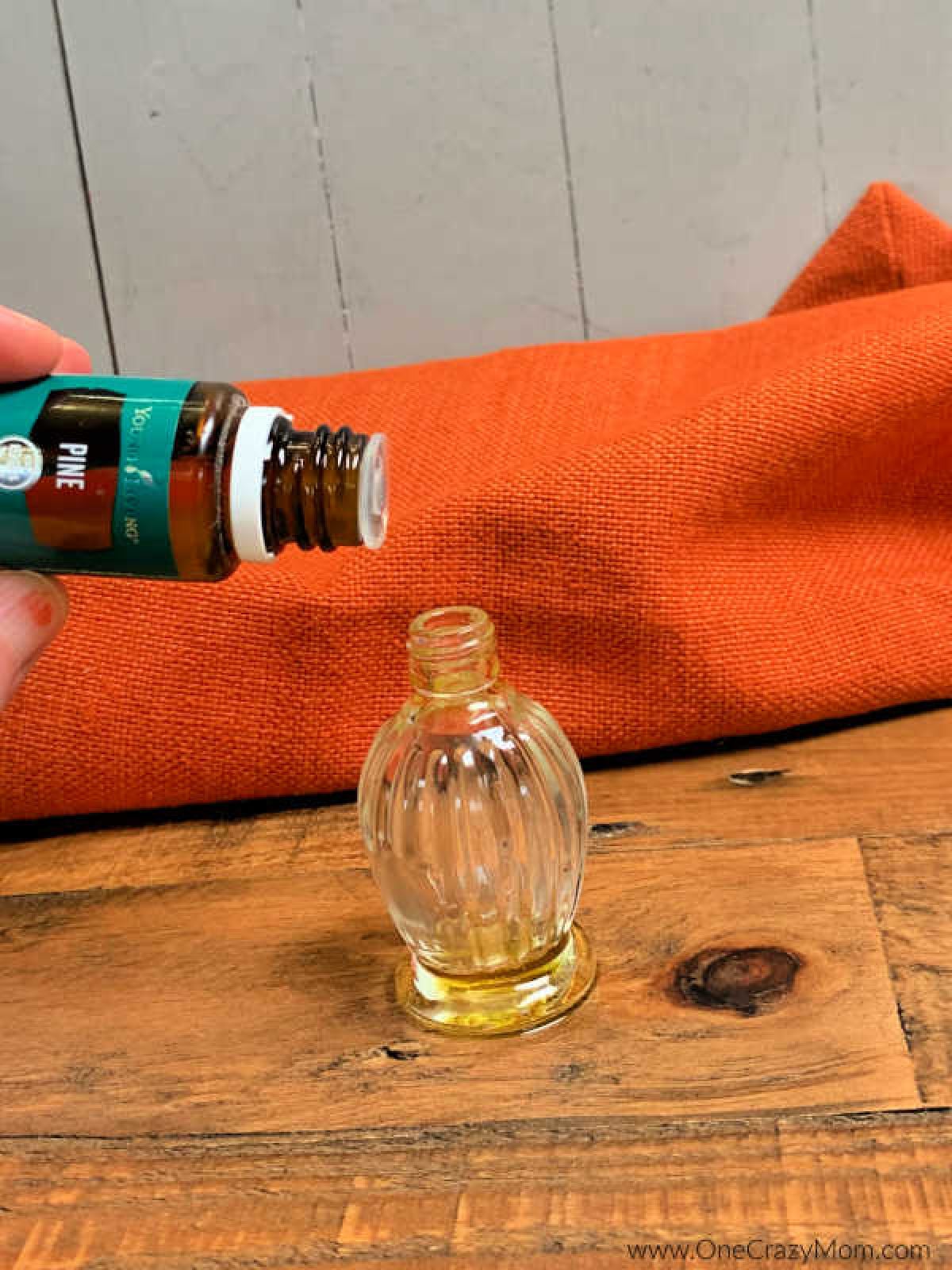 Cologne bottle with essential oils added.