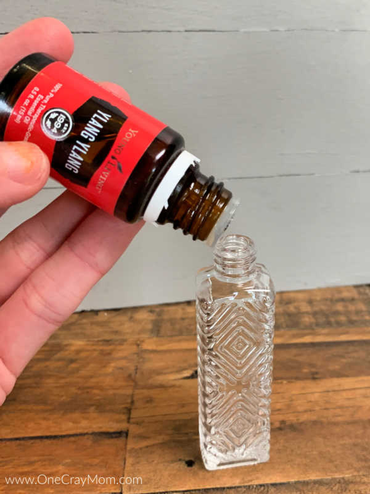First type of essential oil going into bottle.