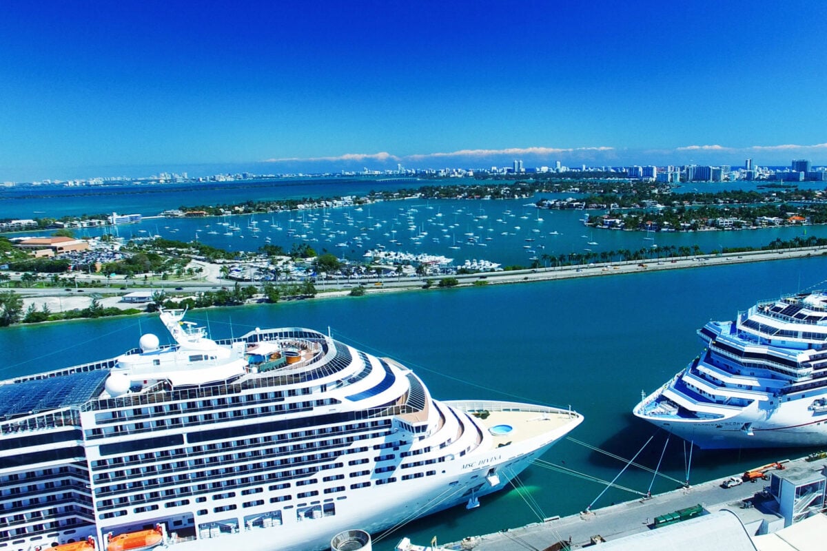 Cruise Ship at port beside another ship.