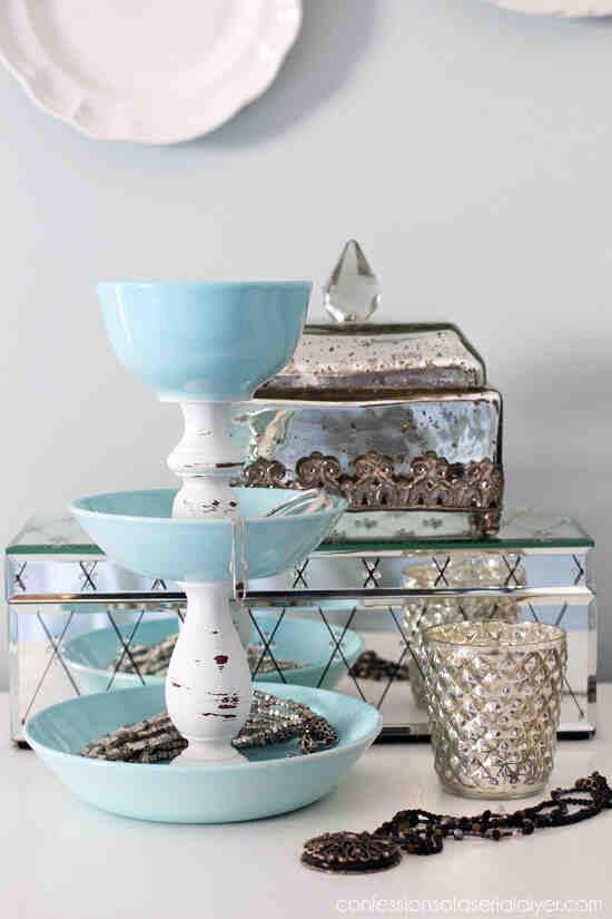 Jewelry storage tiered with items.