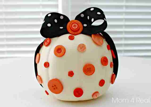 Button pumpkin with ribbon.
