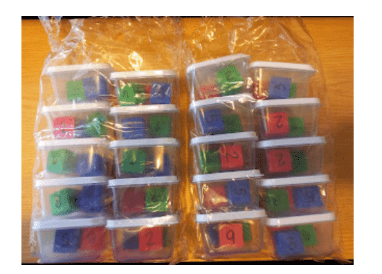 Small containers with pieces.