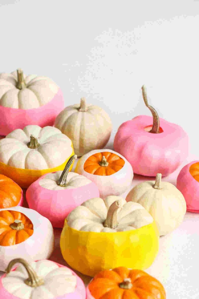 Pile of pumpkins that are balloon dipped.