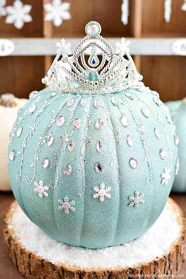 Frozen Elsa pumpkin with glitter and jewels.