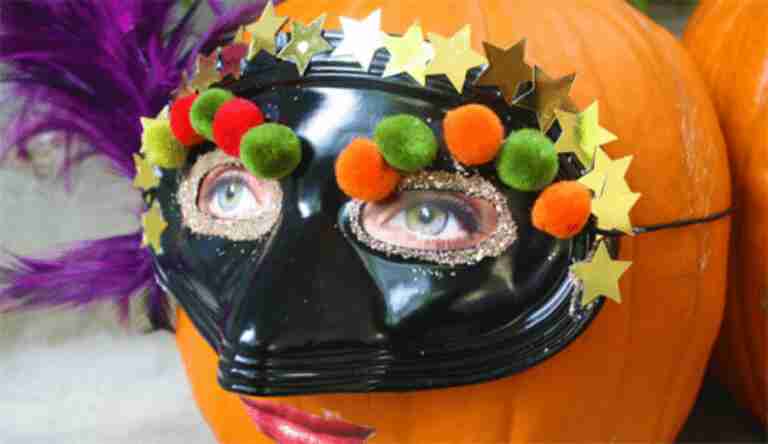 Pumpkin with mask on it.