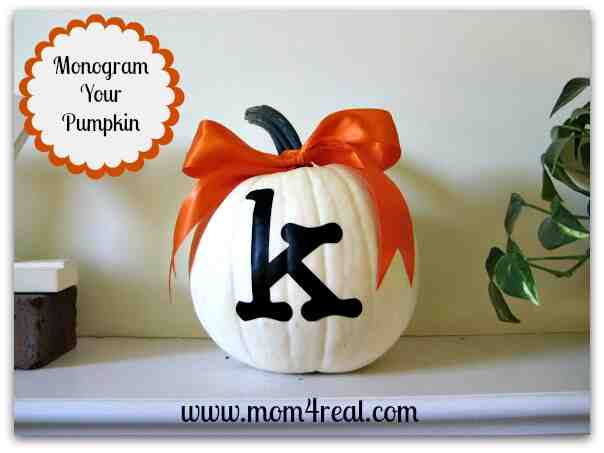 Pumpkin with monogram and ribbon.