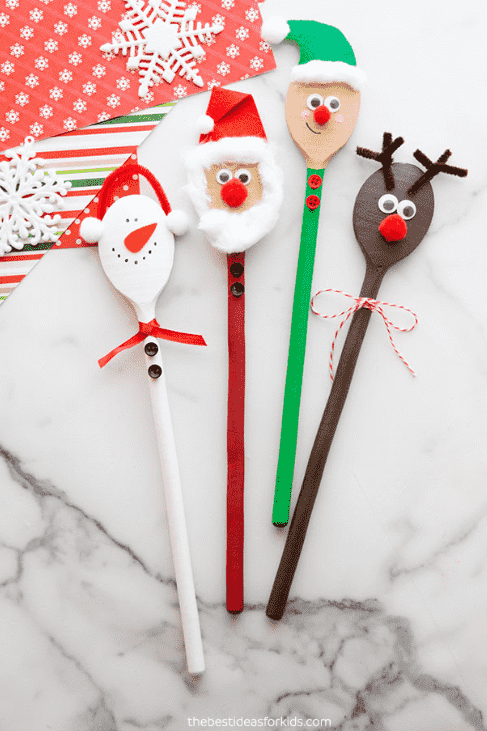 Wooden spoons decorated as Santa, reindeer and elves.