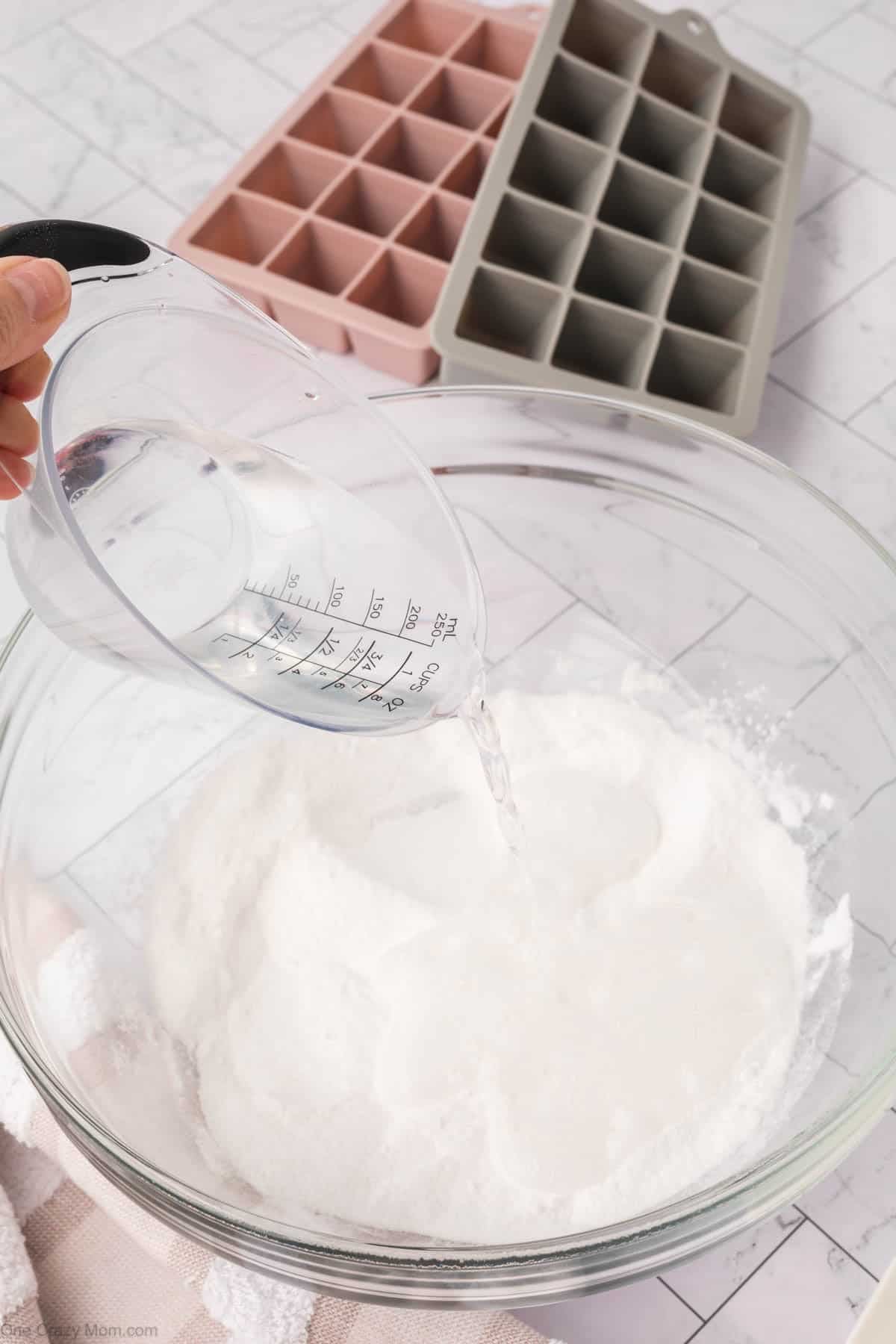 Vinegar poured into mixture.