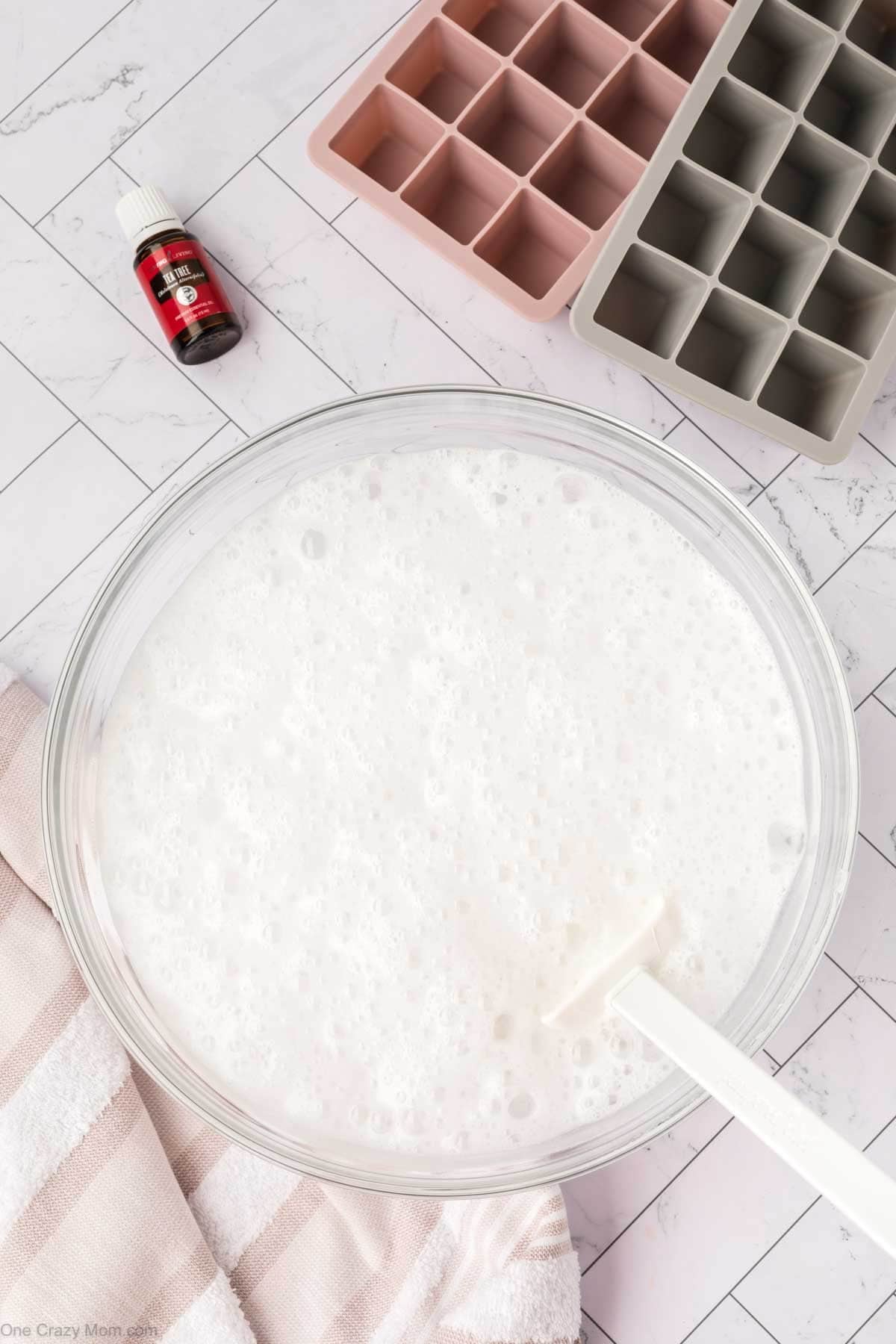 Mixture combined and bubbling in mixing bowl.
