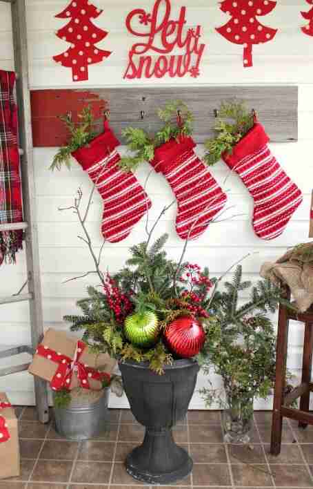 Urns with greenery and ornaments.