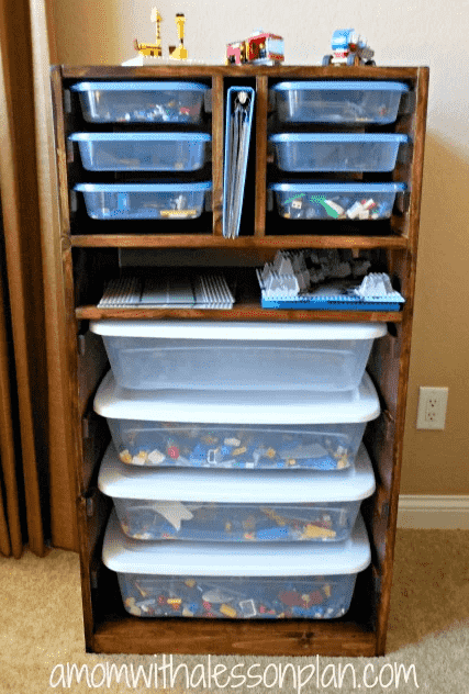 Lego storage bins in shelving.