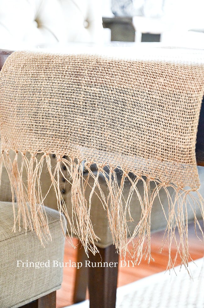 Burlap table runner on a table.