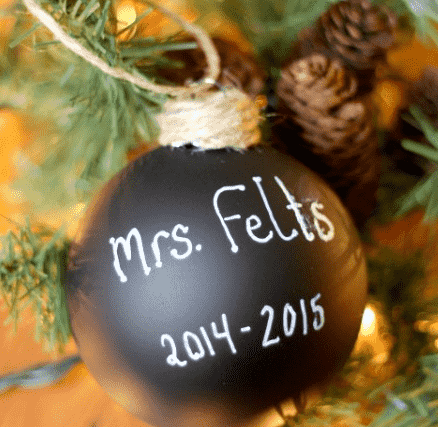 Chalkboard ornament in tree.