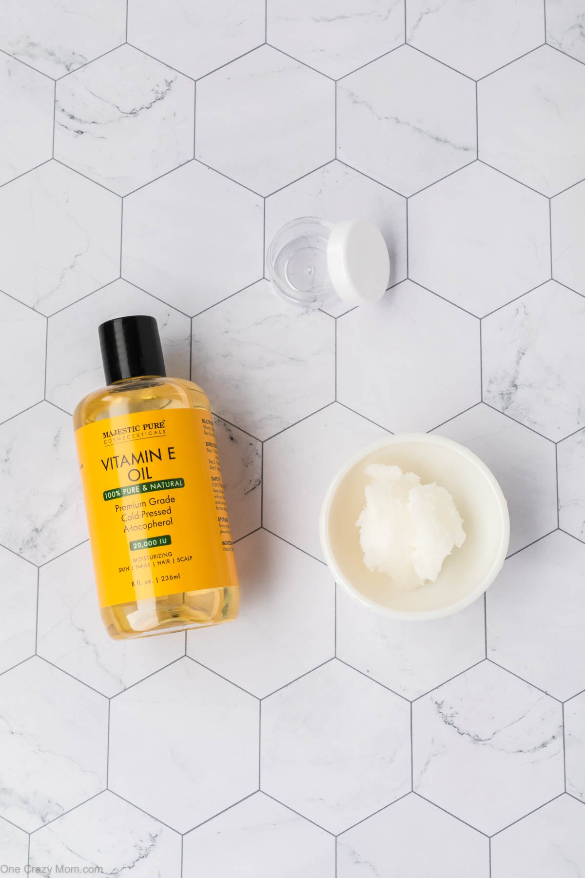 Ingredients for eye cream- coconut oil, vitamin e oil, small containers.
