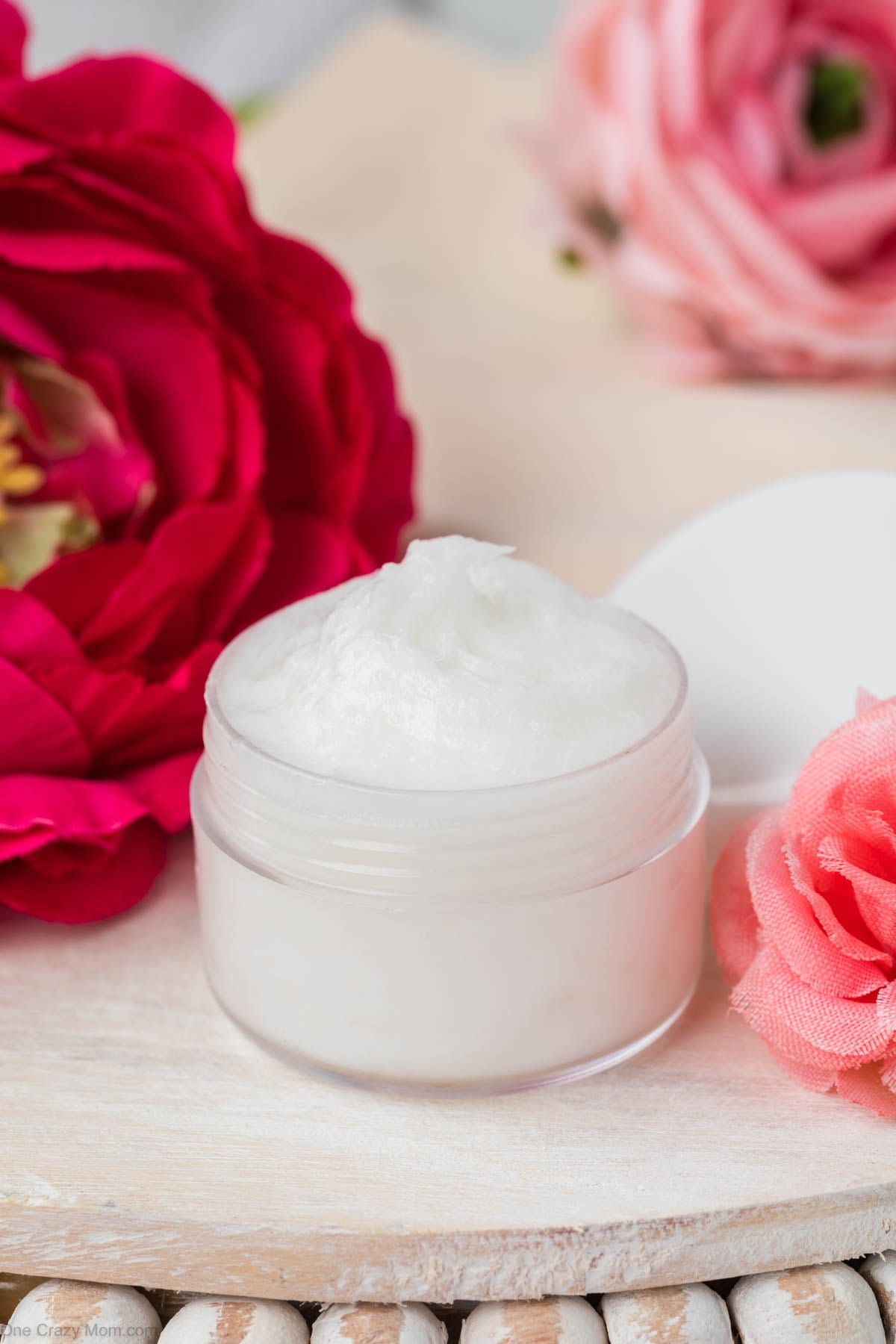 Container of eye cream.