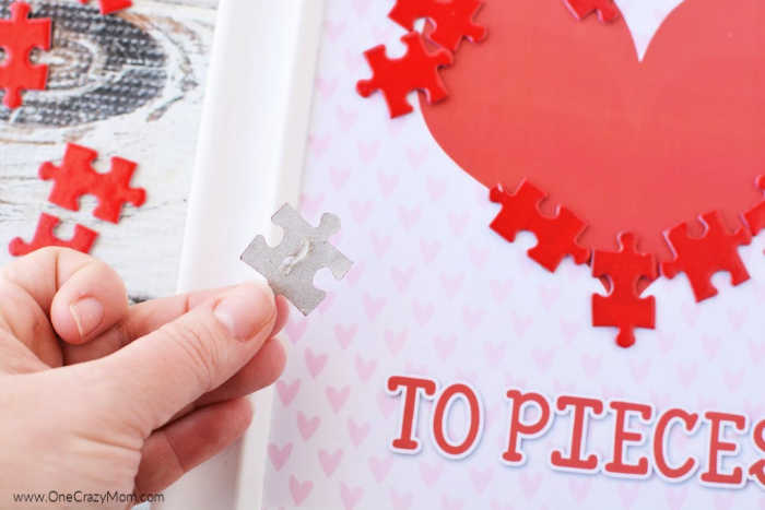 Puzzle attached to heart.