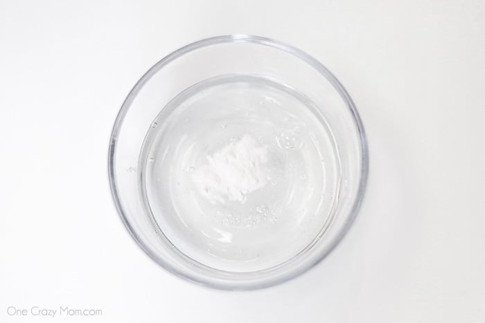 Glue and baking soda combined in a bowl.