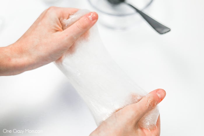 Slime stretched in hands.