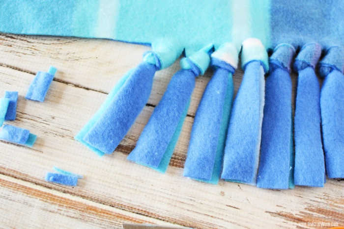 The tassels being trimmed.