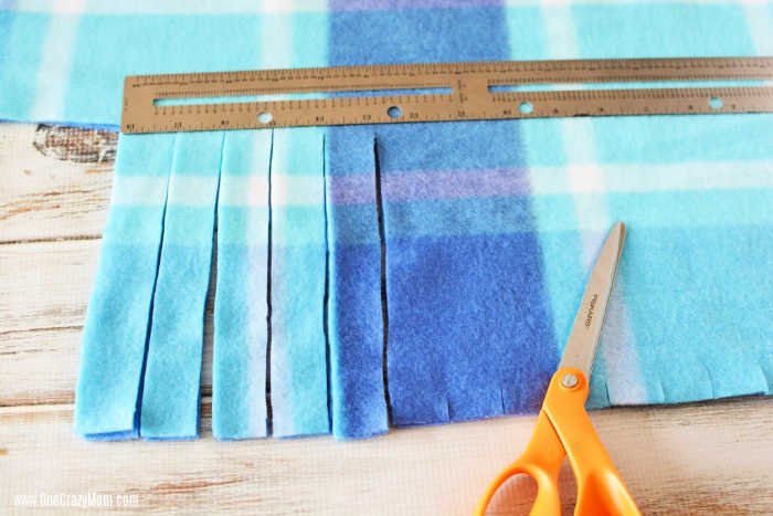 Strips cut out of blanket.