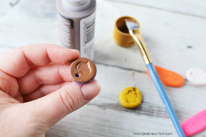 Clay painted brown.