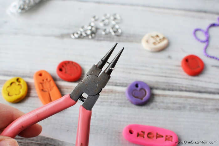 Jump rings opened with pliers.