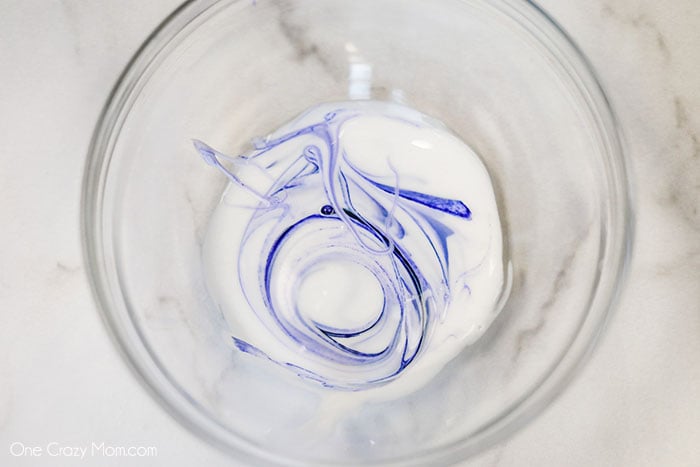 Bowl with glue and food coloring.