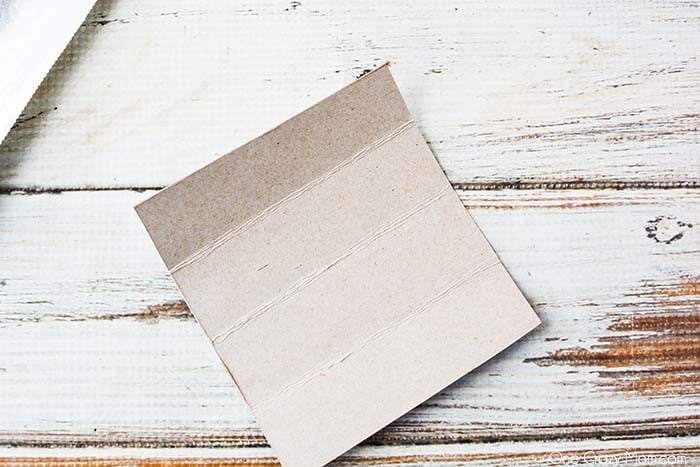 Cardboard folded and measured.