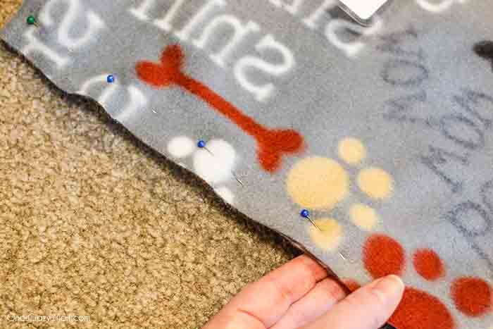 Lay fabric on top and pin.
