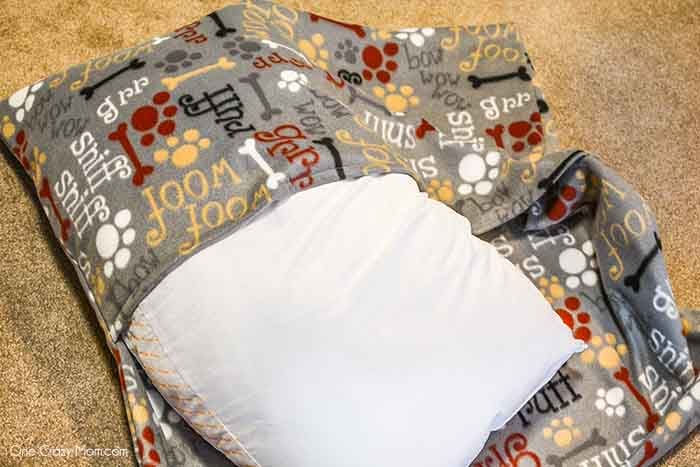 Pillow inserted into case.